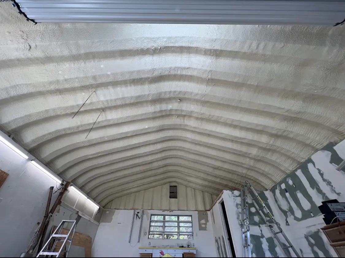 Spray polyurethane foam applied to the underside of a metal roof deck in Ben Lomond